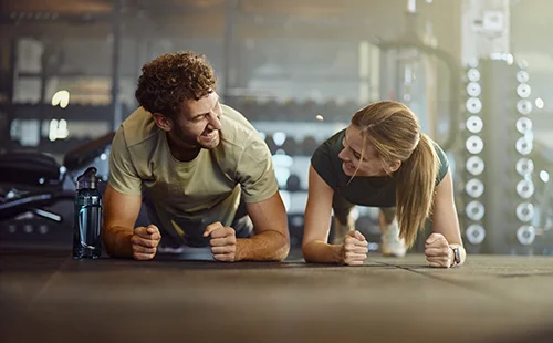 Guy & Girl In Fitness Class