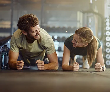 Guy & Girl In Fitness Class